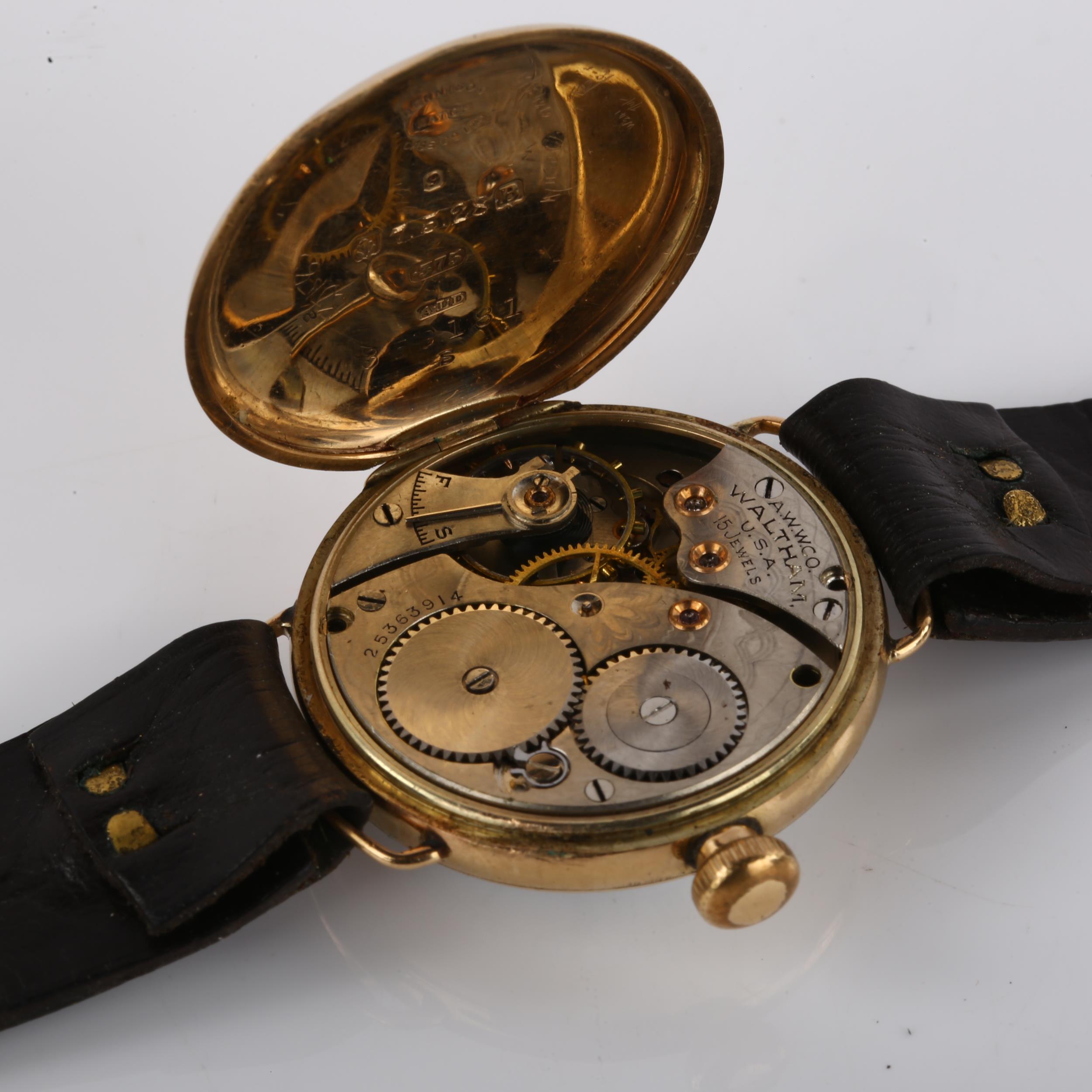 WALTHAM - an early 20th century 9ct gold Officer's trench wristwatch, white enamel dial with Roman - Image 4 of 5