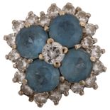 An 18ct white gold blue topaz and diamond cluster ring, setting height 15.9mm, size P, 6.1g No
