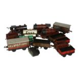 Hornby O gauge tinplate engines and rolling stock, and a quantity of track