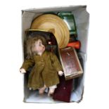 A box containing Simon & Halbig porcelain-headed doll, table linen, mirror, costume jewellery,