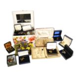 A box of mixed costume jewellery, cufflinks, brooches, jewellery box etc