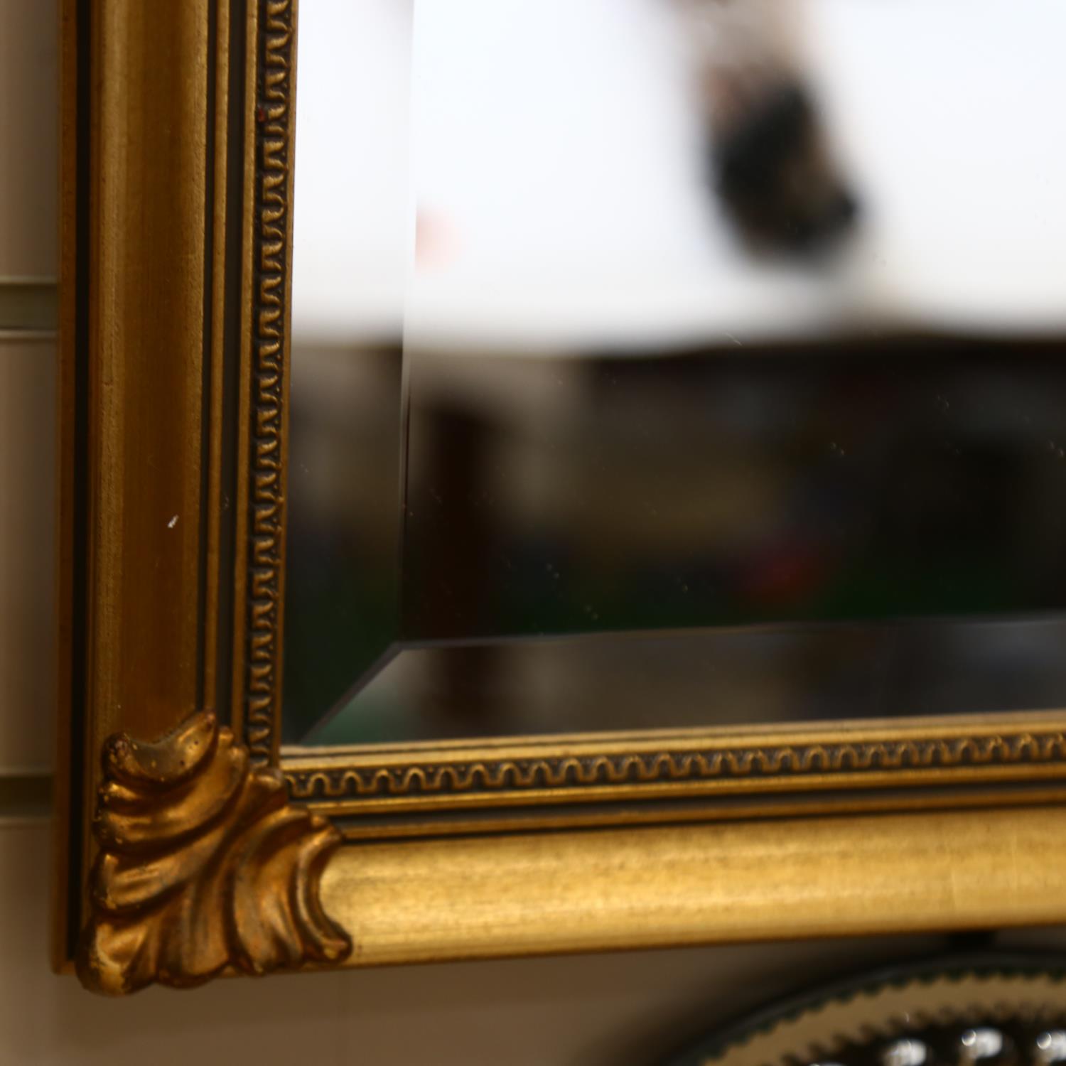 A modern gilt-framed bevel-edge wall mirror, 73cm x 51cm - Image 2 of 2