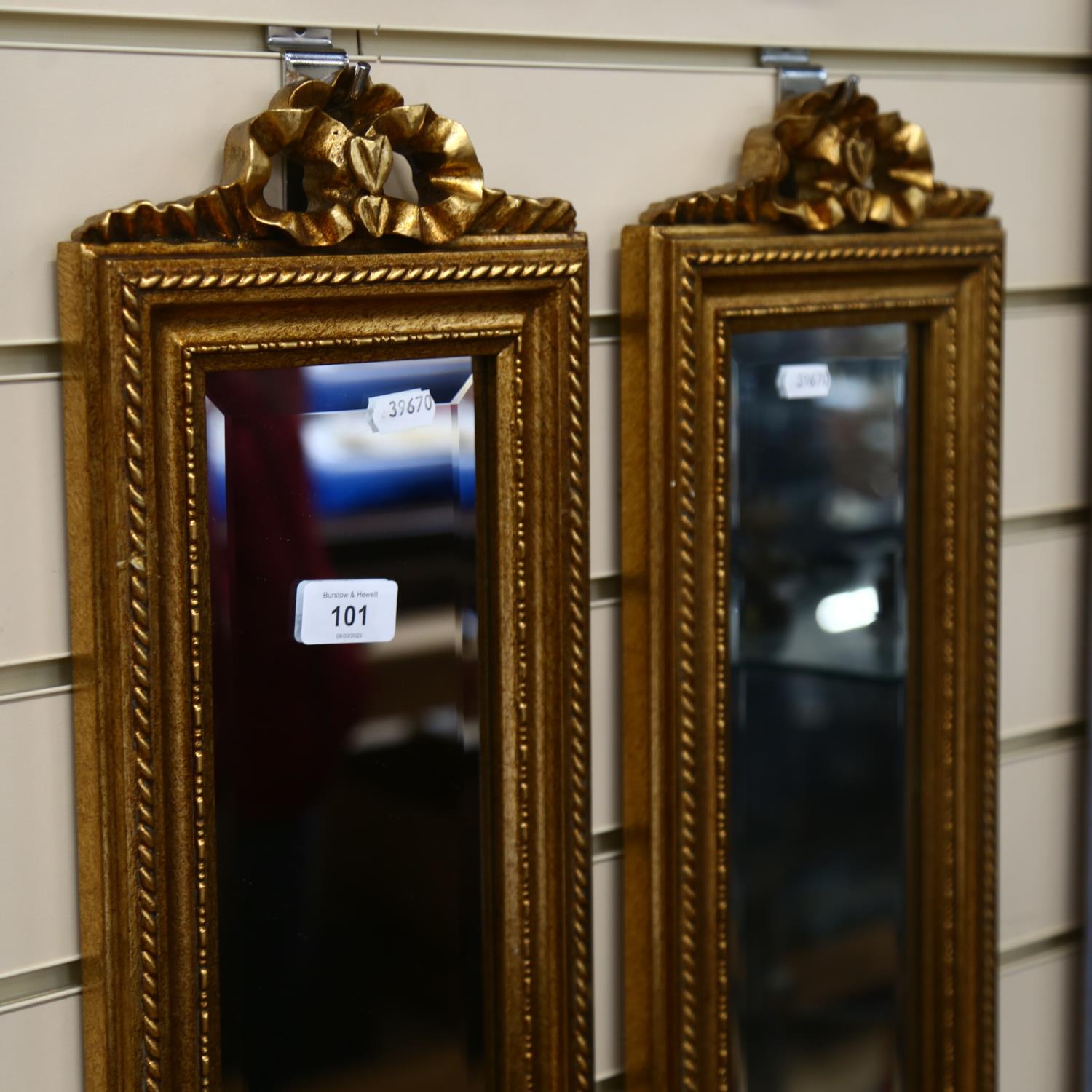 A pair of modern rectangular gilt-framed bevel-edge mirrors of narrow form, with ribbon mount, - Image 2 of 2