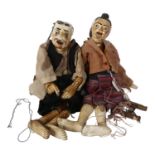 A pair of Vintage South East Asian carved and painted wood marionette puppets, H64cm approx