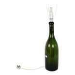 A large Antique green glass bottle converted to an electric lamp, height to top of bottle 58cm