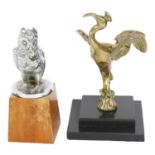 A silvered cast-metal owl car mascot on wooden plinth, H15cm overall, and a mythical brass bird