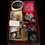 A tray of silver costume jewellery, including a lapis set oval panel bracelet, various earrings,