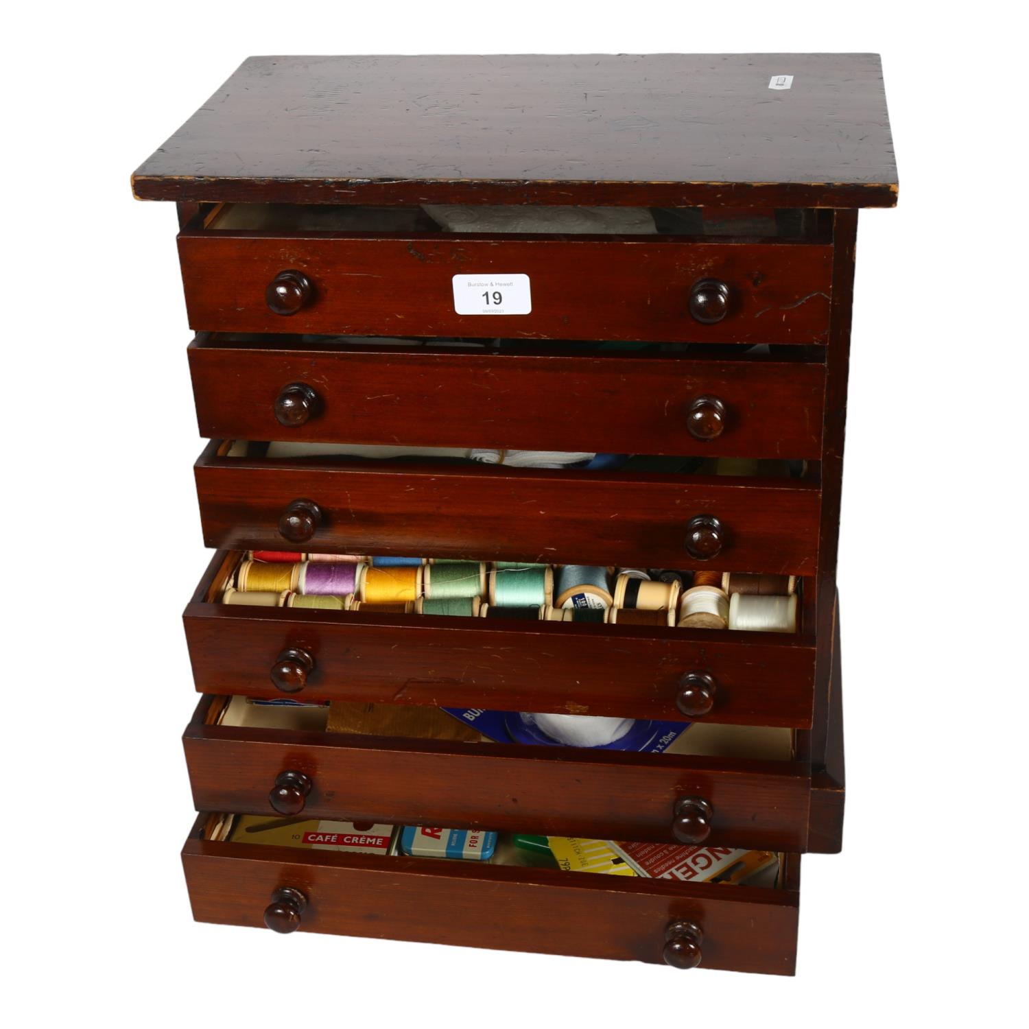 A Victorian stained wood table-top collector's chest, with 6 short drawers and turned wood