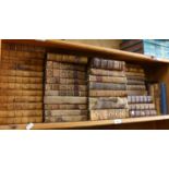 A shelf of Antique leather-bound volumes, including Tennison's Works, Life of Napoleon, and Mahon'