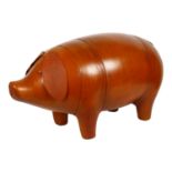 A large tan leather figural pig footstool, in the manner of Liberty, unmarked, L68cm, H39cm