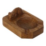 ROBERT MOUSEMAN THOMPSON - an oak ashtray with carved mouse, W10cm Good overall condition, some