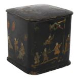 A 19th century Chinese black lacquered papier mache tea caddy, with painted and gilded figure