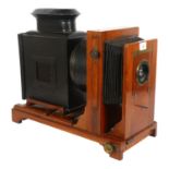 An Antique magic lantern, with sliding projector and bellows, mahogany-mounted, fitted with electric