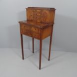 An Edwardian mahogany ladies' writing desk, with raised fitted back, fold-over top and drawers