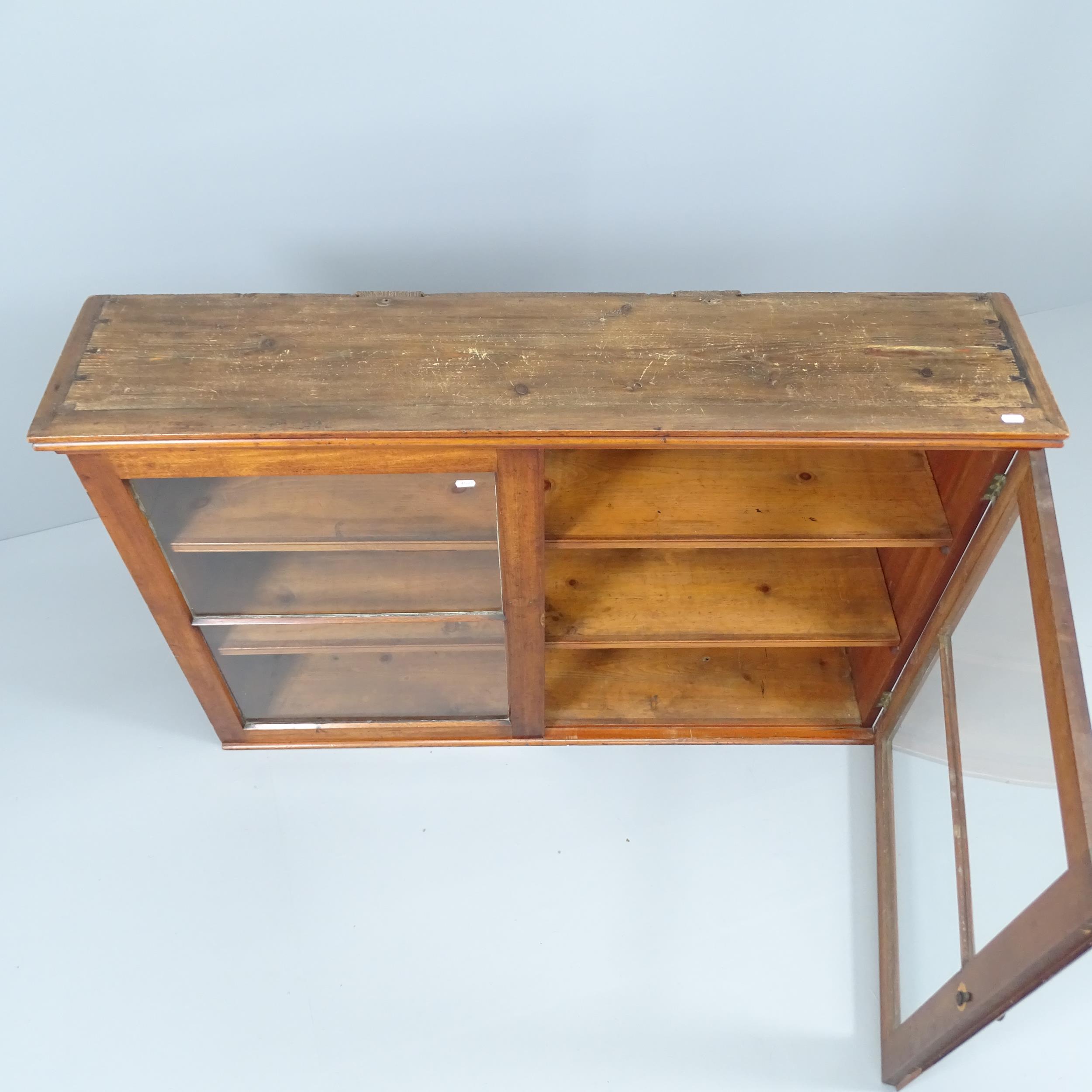 An antique mahogany bookcase, with two glazed doors and two fixed shelves. 127x84x28cm - Image 2 of 2