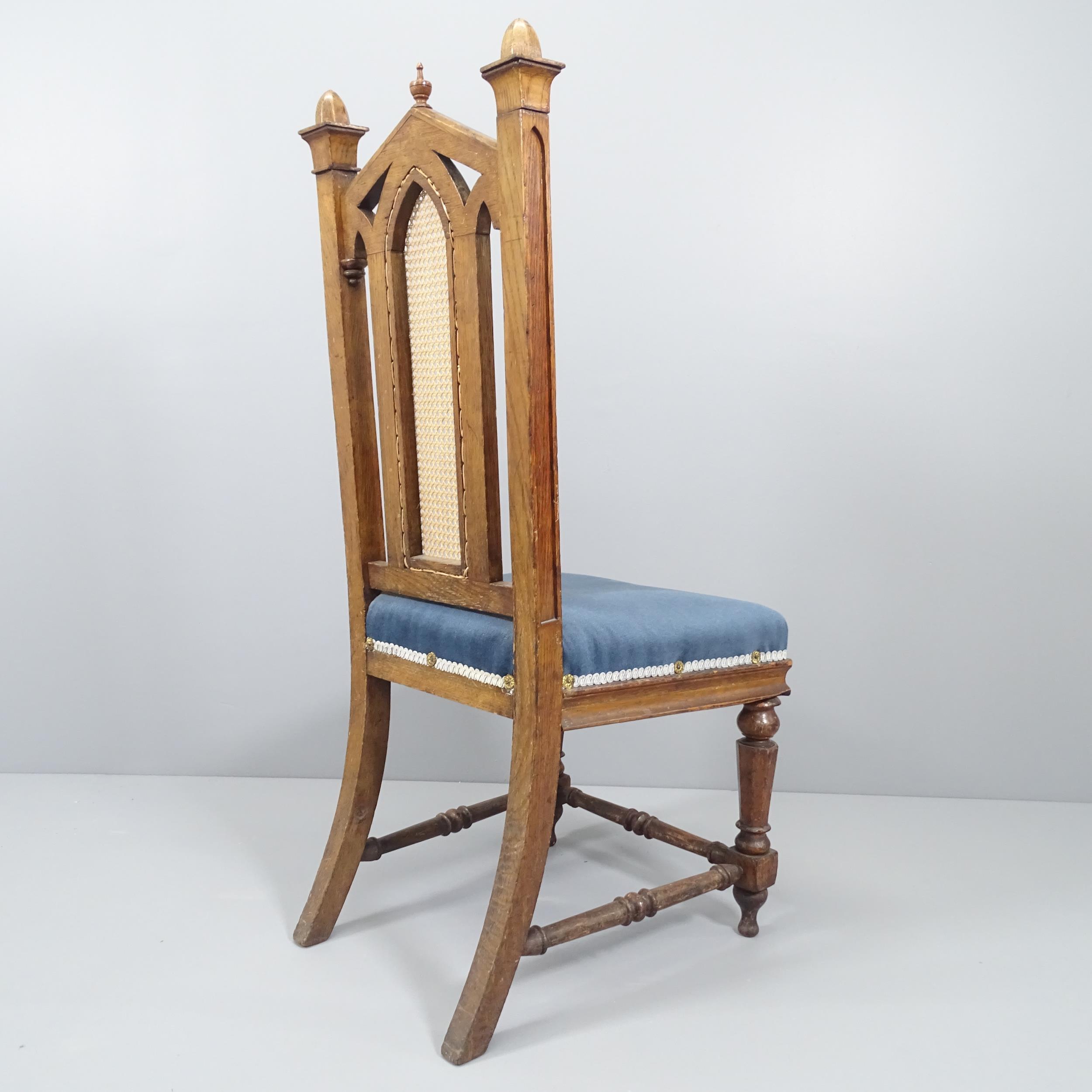 WITHDRAWN - An antique Gothic oak and upholstered Pugin style chair, with cane panelled back. - Image 2 of 2