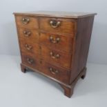 A 19th century oak chest of two short and three long drawers, raised on bracket feet.