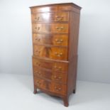 An mahogany bow front chest-on-chest of seven drawers. 70x152x47cm.