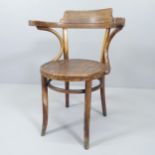 A Thonet-style bentwood elbow chair. Impressed 224 beneath seat.