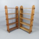 A pair of similar open bookcases with five fixed shelves. Tallest 70x118x21cm.