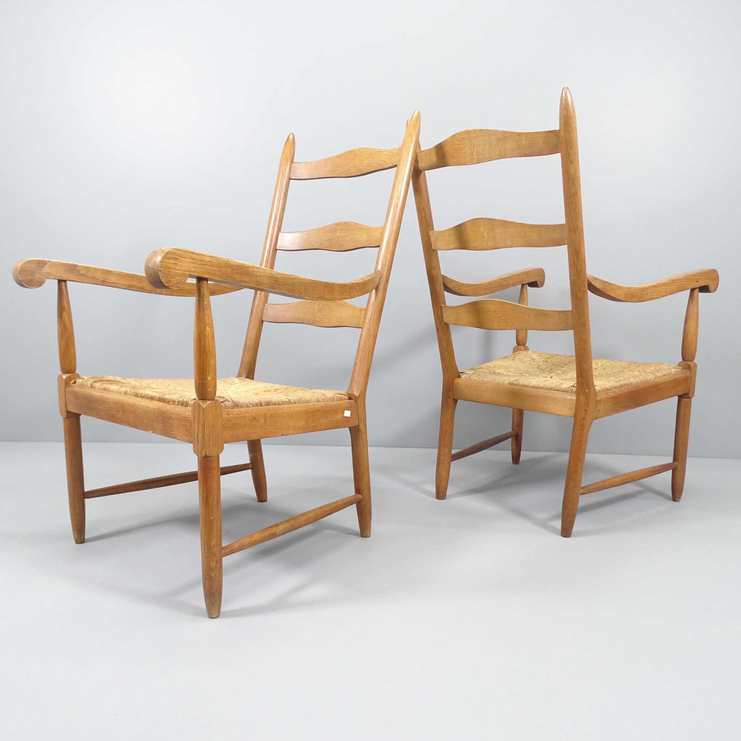 A pair of mid-century ladderback lounge chairs, in oak with rush seats. - Image 2 of 2