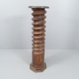 A French elm spiral turned column with circular top, on octagonal base. 30 x 110cm. All over surface