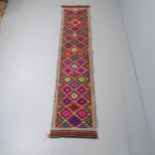 A Suzni Kilim Runner. 263x61cm Good condition.