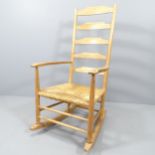 Neville Neal, an LCC Arts & Crafts Cotswold school Ernest Gimson design ladder back rocking chair