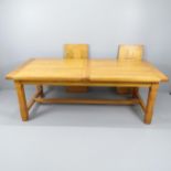 A modern light oak draw-leaf dining table. 220 (extending to 310)x78x102cm. Top is not original to