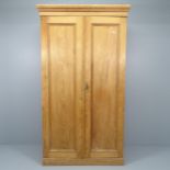 An antique pine two-door compactum wardrobe, with fitted interior. 116x206x57cm.