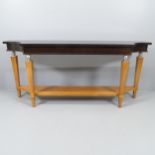 A contemporary mahogany two-tier console table. 180x80x40