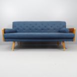 A Mid-century Danish style teak and upholstered three-seater sofa. Overall 183x84x72cm.