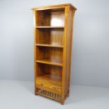 A modern hardwood open bookcase with three adjustable shelves and drawer under. 75x170x35cm