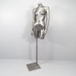 A painted shop display mannequin on stand. Height 175cm. Incorrect arms to torso. some deep