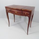 An French mahogany dressing table, with lifting mirrored top and inlaid decoration. Dimensions (