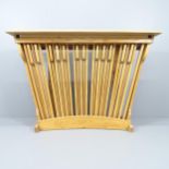 A contemporary design oak console table with organ pedal front. 137x96x35cm Some central struts have