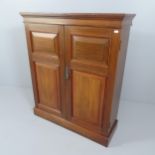 A modern mahogany two door cabinet. 88x104x30cm.