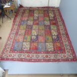 A red-ground Bakhtiar carpet. 350x250cm. Good condition.