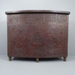 A mid-century Peruvian tooled leather clad bar, with embossed Aztec design. 143x109x61cm Good
