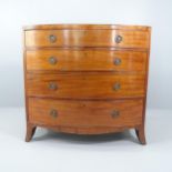 A Georgian mahogany bow-front chest of four long drawers. 100x93x55cm.