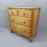 A Victorian-style pine chest of two short and two long drawers. 103x103x50cm Various marks,