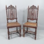 A pair of antique cane seated Carolean-style hall chairs.