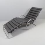 A Bauhaus style lounger in black leather and chrome tubular steel in the manner of Mies van der