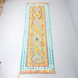 A Chobi Kilim runner, 252x83cm