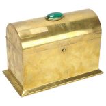A 19th century brass dome-top casket, with oval cabochon inset malachite and engraved decoration,
