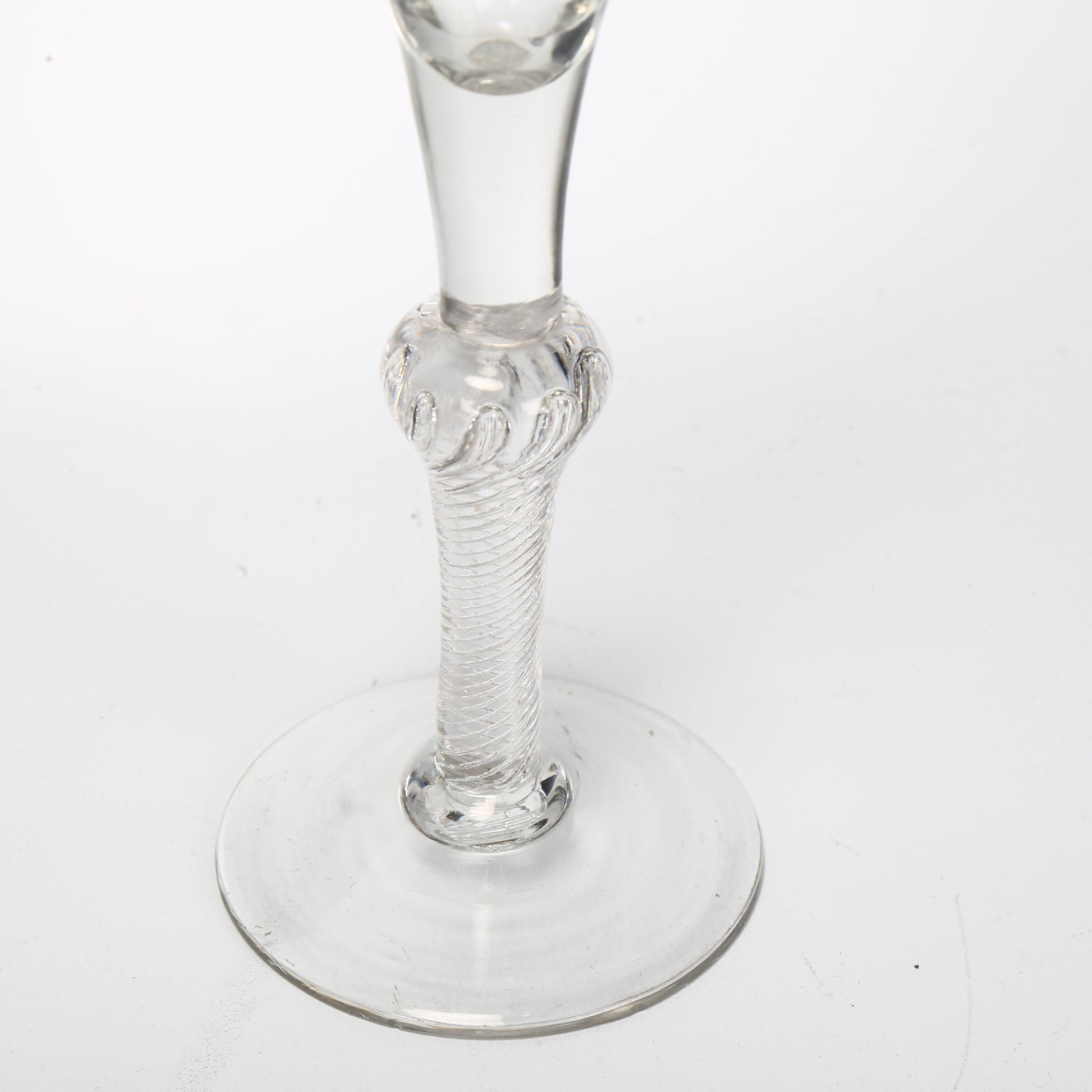 An 18th century baluster air twist wine / cordial glass, height 18cm Good condition, no chips or - Image 3 of 3