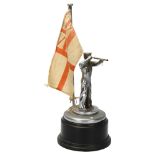 Naval Interest - an early 20th century chromed metal sailor and Royal Ensign flag, on wood plinth,