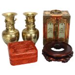 A Chinese table-top cabinet with jade door panels, 2 cinnabar boxes, a pair of brass vases and