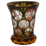 A 19th century Bohemian amber flashed glass spa beaker, with engraved points of interest