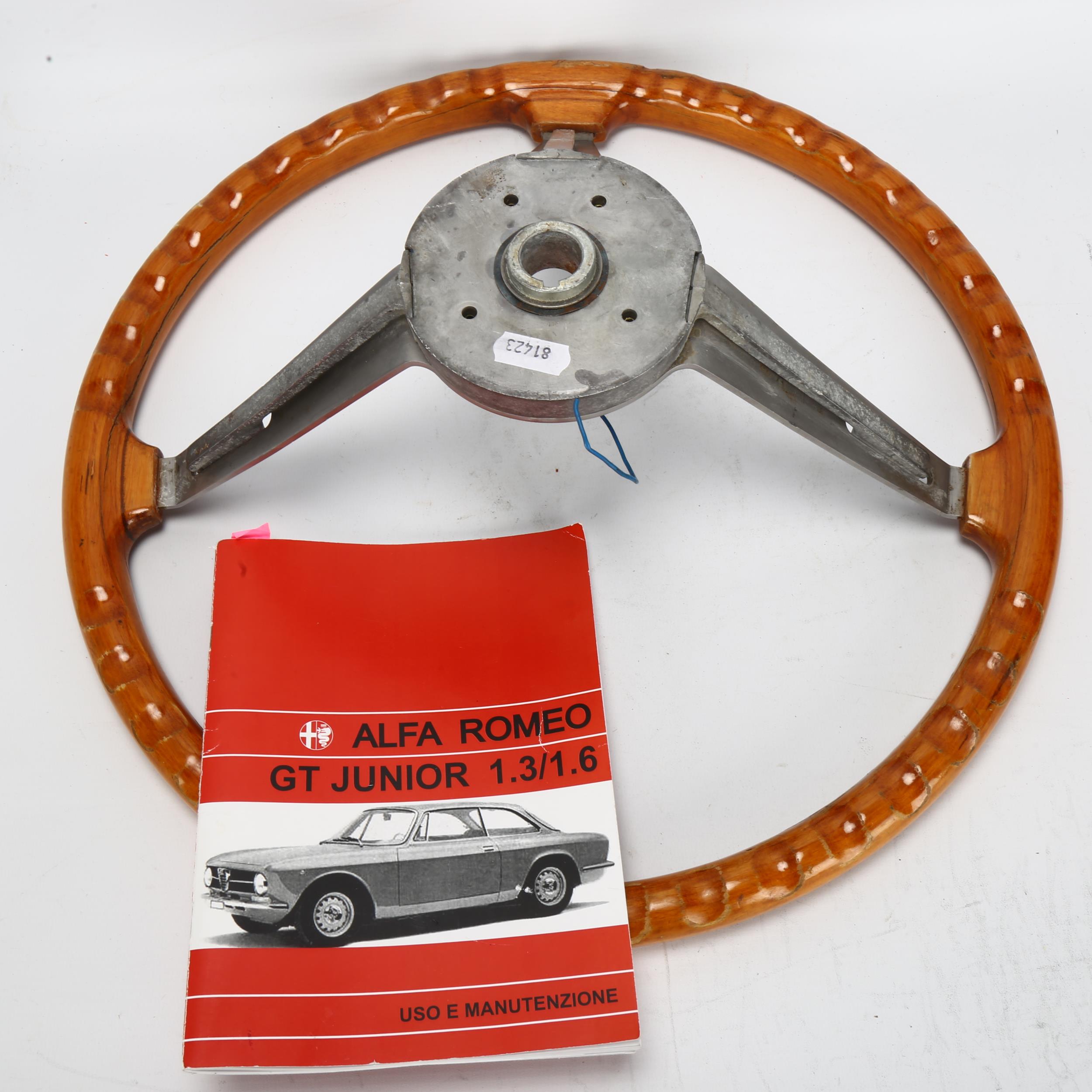 An Alfa Romeo steering wheel and user manual for GT Junior, engraved on metal "Alfa Romeo, - Image 4 of 4